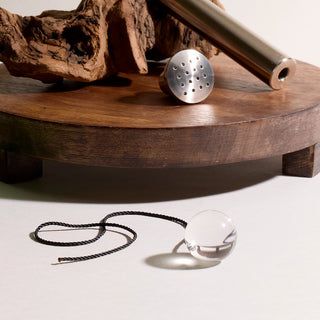 An image of the Biofield Tuning Sound Healing neutral acrylic pendulum.