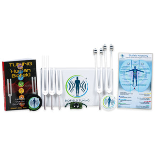 A image of the Biofield Tuning sound healing book, 5 tuning forks, Small Anatomy Map, Hockey Puck Activator and Pendulum